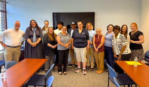 Nirenstein, Horowitz & Associates pose for picture with athletes