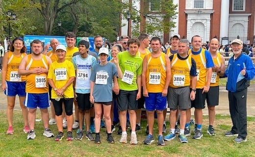 Group of runners pose for a picture