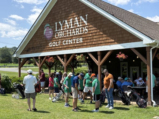 26 GolfSkillsJam group by bldg w sign