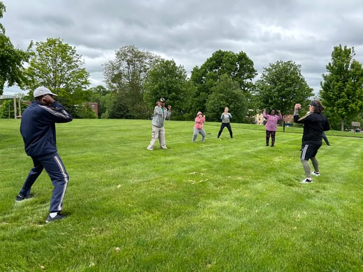 Fall Fitness Festival group in grass