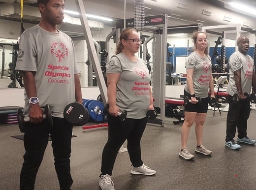 4 Members of Team CT lifting weights at UHart